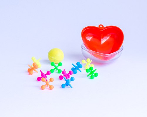 Cápsula de Corazón con Jacks